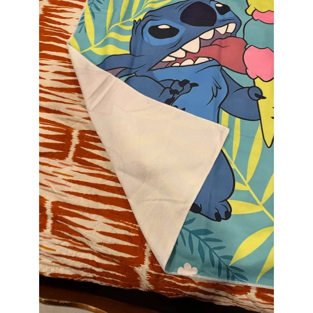 Stitch beach towel with Stitch holding a multi-colored ice cream palm leaves